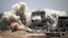 Dozens Reported Killed In Air Strike On IS Prison In Syria