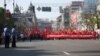 Police in the Ukrainian capital, Kyiv, watched as Communist Party supporters paraded on Labor Day in 2012.