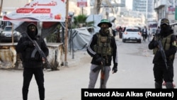 Militantë të Hamasit dhe të Xhihadit Islamik Palestinez në qytetin e Gazës.