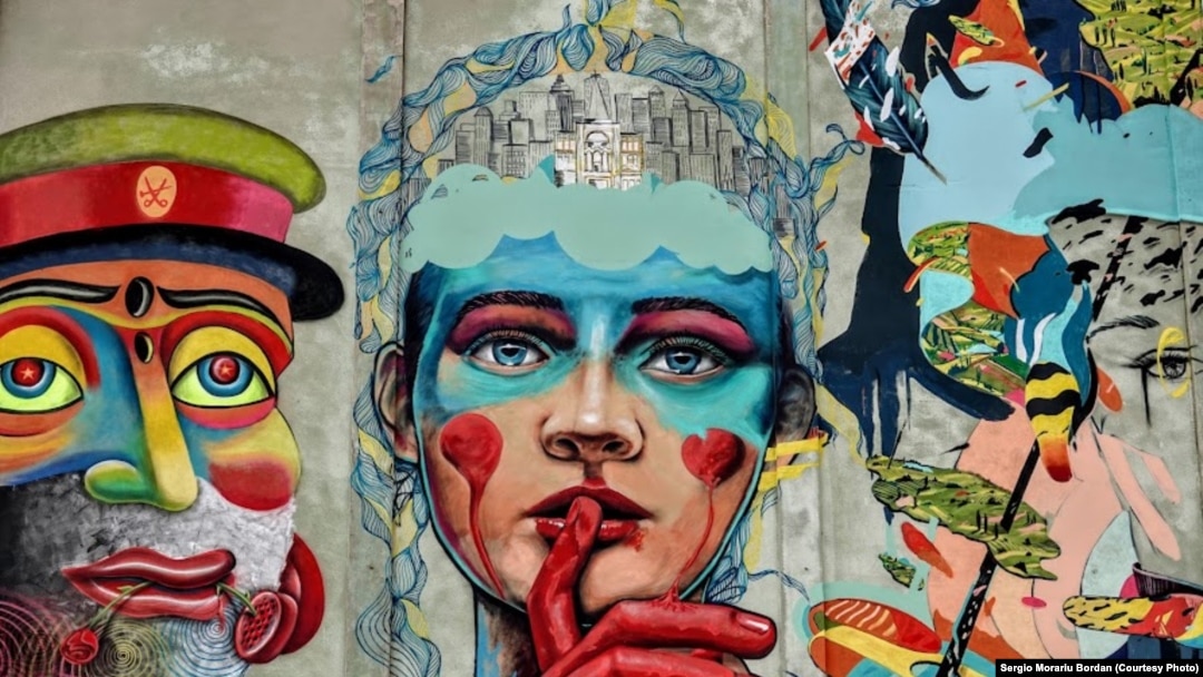 Lucrare de Street Art realizată în 2019 de Alex Baciu, Flaviu Rouă, IRLO și Corina Nani pe silozul Comcereal din Timișoara