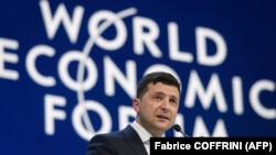 Ukraine's President Volodymyr Zelensky delivers a speech at the World Economic Forum annual meeting in Davos, on January 22, 2020