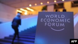 Swiss. Participants arrive at the congress centrre prior to the opening of the World Economic Forum in Davos. Junuary 21, 2014. 