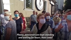 Moldovans Line Up For Vaccine Shot As Ex-President Walks By