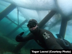 Yegor Lesnoi diving in Lake Baikal