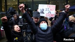 Supporters celebrate in London after the judge's ruling against Assange's extradition on January 4.