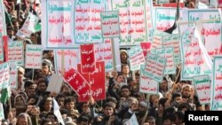 Houthi supporters rally against the U.S.-led strikes, in Sanaa