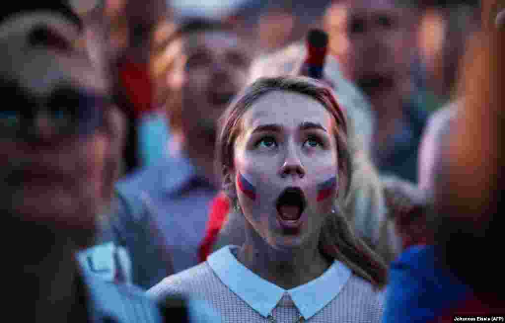 A Russian fan reacts as she watches the 2018 World Cup Group A football match between Russia and Egypt at the Fan Zone in Nizhny Novgorod. Russia won 3-1. (AFP/ Johannes Eisele)