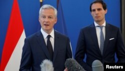 Вазири иқтисоди Фаронса Бруно Ле Мэр (аз чап) 