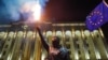 An anti-government protester take part in a demonstration in Tbilisi earlier this month. 