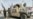 Taliban officers patrol a street during a rally marking the fourth anniversary of the militants' takeover of Afghanistan, in Ghazni on August 15, 2025.