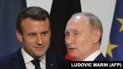 Францускиот претседател Емануел Макрон и неговиот руски колега Владимир Путин во Париз по самитот за Украина, 9.12.2019.