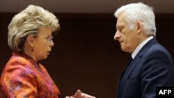 EU Justice Minister Viviane Reding (left) speaks with European Parliament President Jerzy Buzek