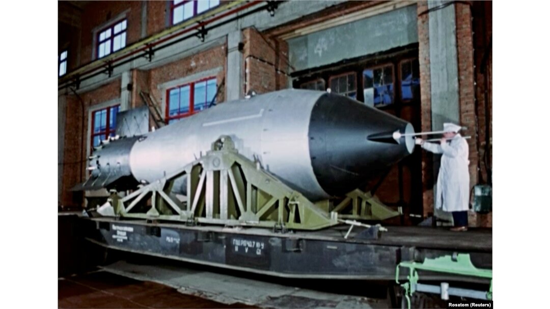 A constructor works on the so-called Tsar Bomba at an unknown location in this still image from previously classified footage taken in 1961.