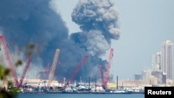 Дим піднімається в небо після вибухів, що пролунали в Манамі, Бахрейн, 28 лютого 2026 року