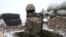 An Armenian soldier on combat duty on the border with Azerbaijan (file photo)