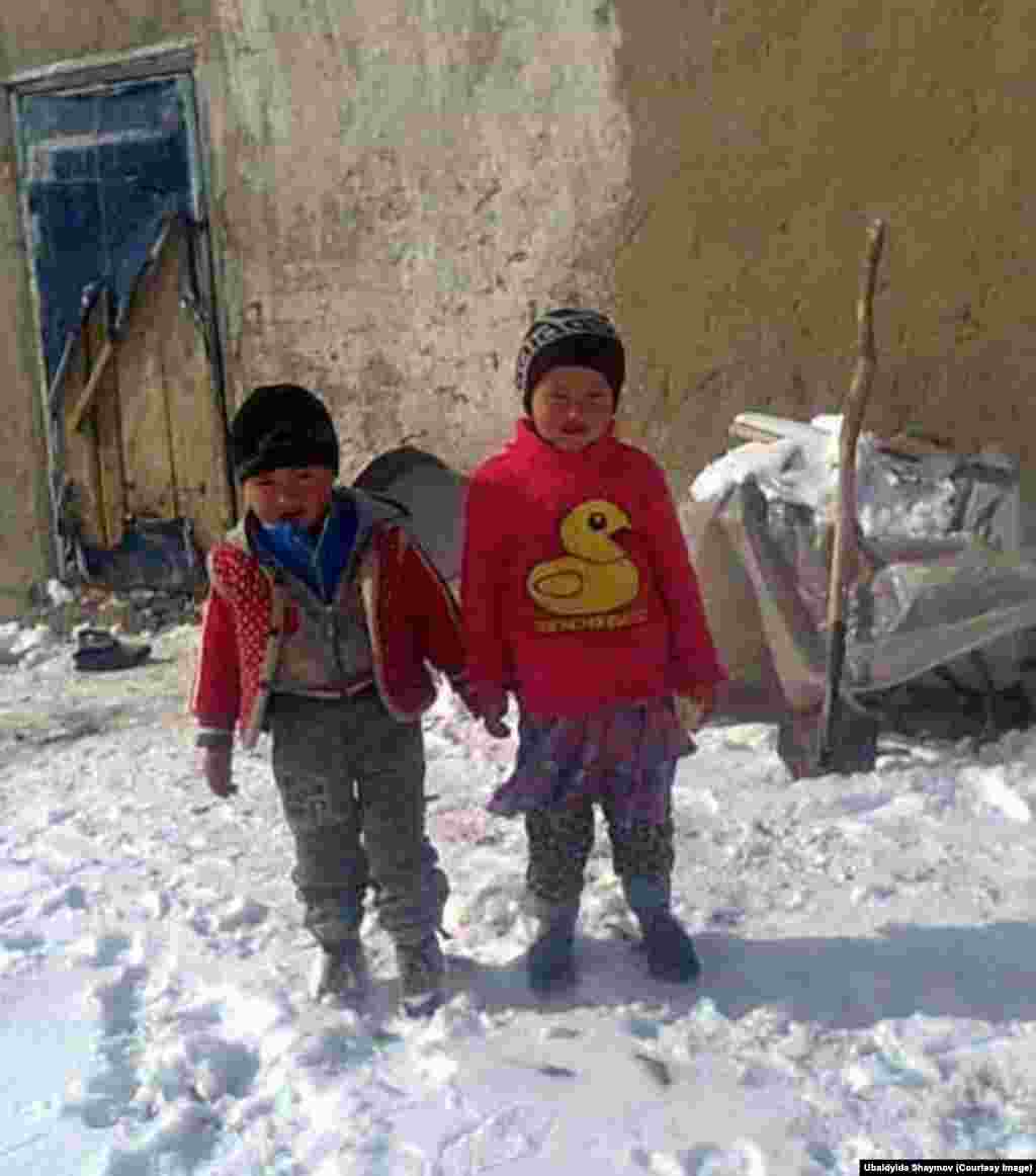 The photographer&#39;s young niece and nephew. Their father, Shaimov&#39;s brother, is a road repair worker along the Pamir Tract which connects Osh, Kyrgyzstan, with Khorog in Tajikstan.