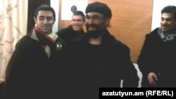 Armenia - Armenian-American businessman Nareg Hartounian is greeted by friends after being released from jail, 13Dec2011.