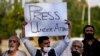 Pakistani journalists and members of civil society take part in a demonstration to condemn attacks on journalists, in Islamabad on May 28.
