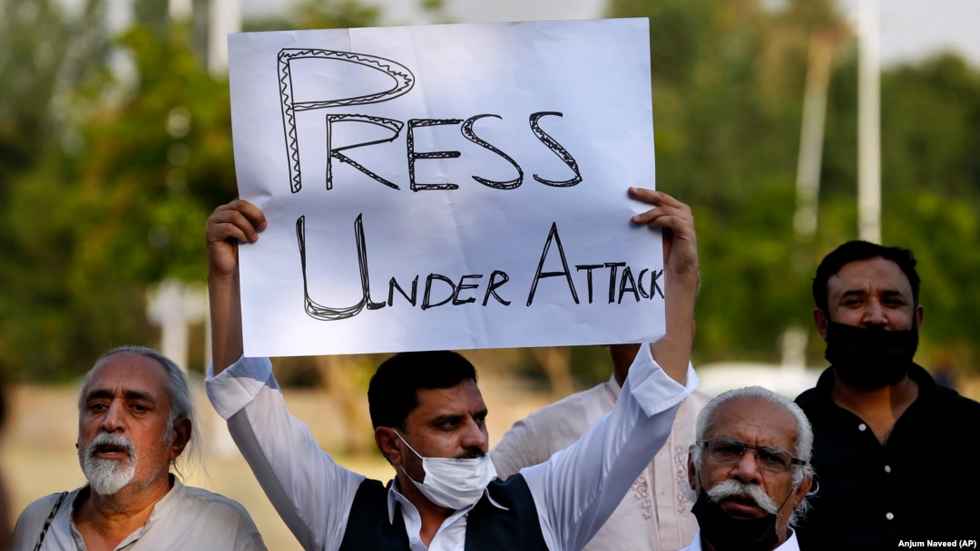 Pakistani journalists and members of civil society take part in a demonstration to condemn attacks on journalists, in Islamabad on May 28.