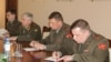 Armenia -- Colonel-General Aleksandr Postnikov (second from left), commander of Russian ground forces, meets with Defense Minister Seyran Ohanian, 1Apr2011.