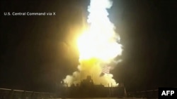 Missile fire from a US warship in the Middle East as American military campaign against Iran continues.