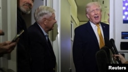 Дональд Трамп (праворуч) і Ліндсі Грем у Флориді, січень 2026 року