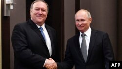 Майк Помпео и Владимир Путин, 14 мая 2019 г. 