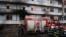 ROMANIA -- Firefighters gather in the courtyard of the Matei Bals infectious diseases hospital's burned pavilion in Bucharest, January 29, 2021