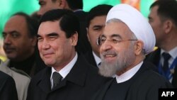 Eýranyň prezidenti Hassan Rohani (s) we Türkmenistanyň prezidenti Gurbanguly Berdimuhamedow (c), Türkmenistan, 3-nji dekabr, 2014.
