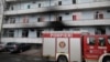 A firetruck is seen at the site of COVID-19 hospital Matei Bals, after a fire broke out in one of its buildings, in Bucharest, on January 29.