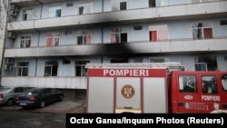 A firetruck is seen at the site of COVID-19 hospital Matei Bals, after a fire broke out in one of its buildings, in Bucharest, on January 29.