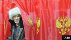 A man leaves a ballot booth at a polling station in Khakassia on March 14.