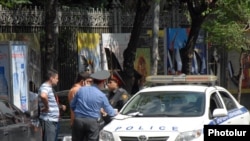 Armenia -- Traffic police fine a driver in Yerevan, undated.