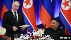 Russian President Vladimir Putin and North Korean leader Kim Jong Un attend a state reception in Pyongyang in June where the pact was agreed.