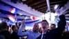 Mbështetësit e partisë së ekstremit të djathtë në Francë, Fronti Kombëtar, festojnë, pasi presidenti francez, Emmanuel Macron, shpalli zgjedhje të reja, 9 qershor 2024.