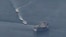 Iranian vessels take part in what what the U.S. Navy says were "unsafe and unprofessional actions against U.S. navy ships in the Persian Gulf on April 15. 