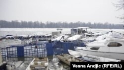 Some of the boats damaged by ice lie in the Belgrade stretch of the Danube River on February 20.