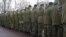 Some 200 Ukrainian veterans turned their backs to President Viktor Yanukovych.