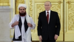 Afghanistan's ambassador to Russia, Gul Hassan Hassan, formally presents his official diplomatic papers to Russian President Vladimir Putin at the Grand Kremlin Palace in Moscow in January. In July 2025, Russia became the first country to formally recognize the Taliban government, and it remains the only one to have done so.