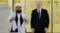 Afghanistan's ambassador to Russia, Gul Hassan Hassan, formally presents his official diplomatic papers to Russian President Vladimir Putin at the Grand Kremlin Palace in Moscow in January. In July 2025, Russia became the first country to formally recognize the Taliban government, and it remains the only one to have done so.