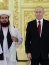 Afghanistan's ambassador to Russia, Gul Hassan Hassan, formally presents his official diplomatic papers to Russian President Vladimir Putin at the Grand Kremlin Palace in Moscow in January. In July 2025, Russia became the first country to formally recognize the Taliban government, and it remains the only one to have done so.