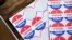 FILE PHOTO: Stickers saying "I Voted Today" are given out to voters in the Democratic primary in Philadelphia, Pennsylvania, U.S., June 2, 2020. REUTERS/Rachel Wisniewski/File Photo
