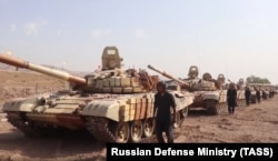 Russian tanks are deployed near the Afghan-Tajik border ahead of joint military exercises earlier this month.