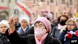 Women marched peacefully in Minsk on March 21 while other small opposition demonstrations were also held outside the Belarusian capital. (file photo)