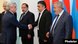 Armenia - President Serzh Sarkisian greets leaders of the Armenian Revolutionary Federation before concluding a new power-sharing agreement with them in Yerevan, 11May2017.