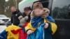 Ukrainian children returning home in February after being held in Russia. 
