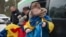Ukrainian children returning home in February after being held in Russia. 