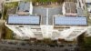 A solar panel installation on top of an old residential block in Sofia Bulgaria Green deal 