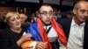 Armenia - Former POW Hakob Injighulian is greeted by his parents on his return to Armenia after yearlong captivity in Azerbaijan, Yerevan, 2Oct2014.