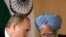 President Putin (left) with Prime Minister Singh in New Delhi on January 25